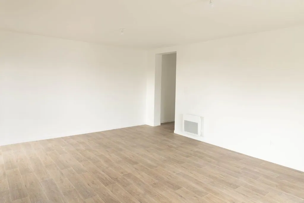 Le séjour, ouvert sur l'extérieur, Appartement 01 T2 à Agen
